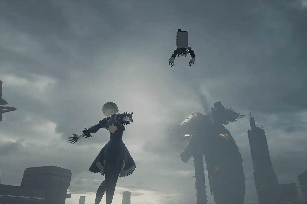 A HD screenshot from Nier: Automata, with 2B doing a beautiful pose in front of a beautiful scenery